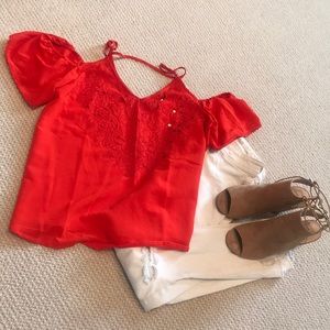Bright red cold shoulder top